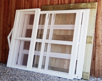 Disassembled greenhouse stored in garage