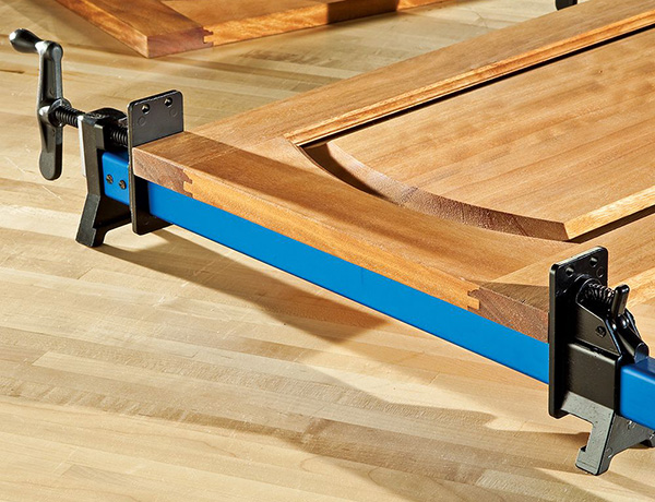 aluminum bar clamp assembling a cabinet door