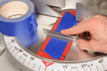 Filling throat plate gap with tape