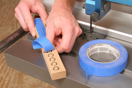 Securing wood plugs in place in blank with painter's tape