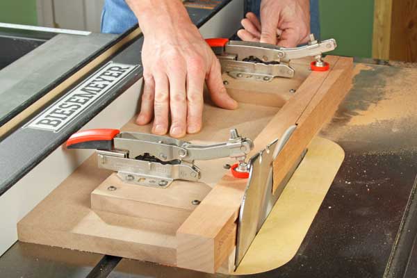 Making a tapered cut using a toggle clamped jig