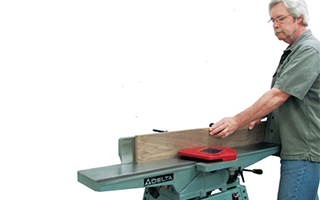 AJ Hamler using a jointer