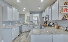 kitchen with white cabinets