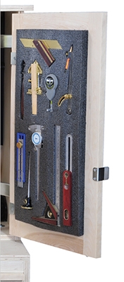 Tools pressed into kaizen foam block and stored in tool cabinet