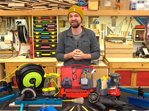 Michael Alm displaying his favorite new woodworking tools