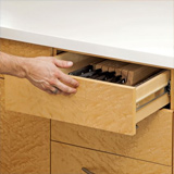 Opening a drawer with a touch-to-open slide