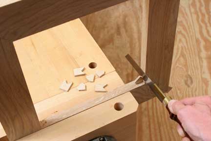 Trimming edges of spline with a hand saw