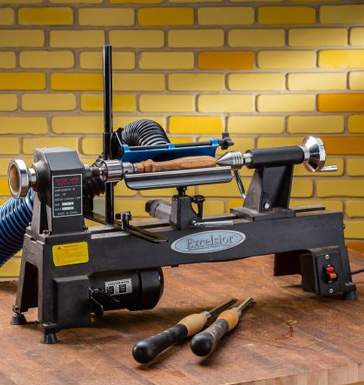 Benchtop lathe with turning tools and accessories