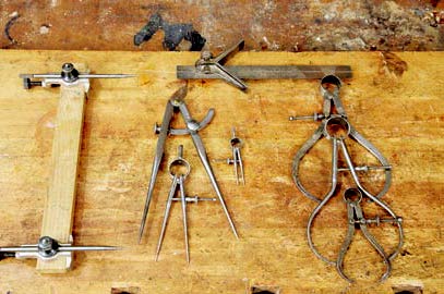 Differently sized calipers and other measuring tools for woodturning