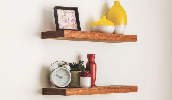 two completed floating shelves on wall