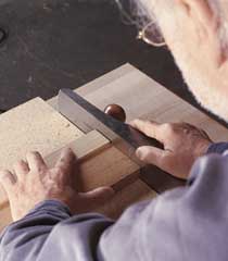 Planing a board fixed to a shooting board