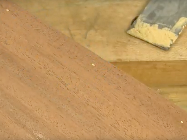 Small pin holes in lumber filled with wood filler