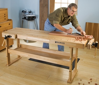 Planing a board on a workbench finished with paste wax