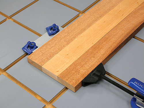Demonstrating the glue-up for a standard edge-to-edge butt joint