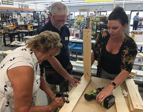women clamping wood pieces during Rockler class